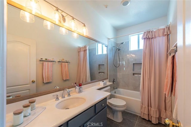 full bathroom with toilet, vanity, shower / bath combo with shower curtain, and tile patterned floors