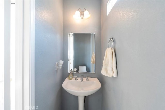 bathroom with a sink and toilet