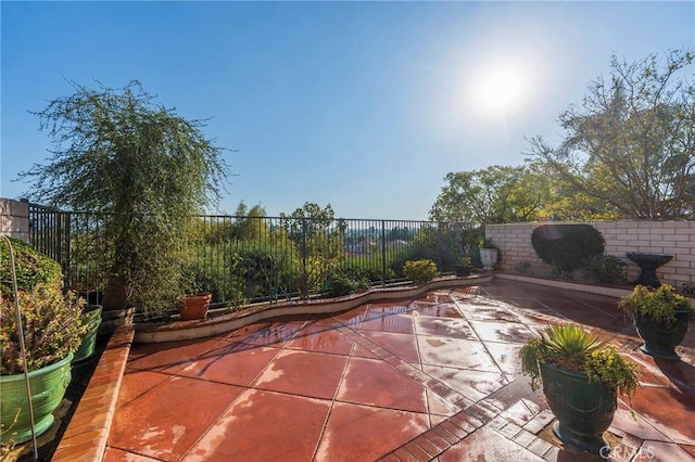 view of patio with fence