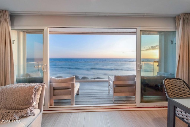 entryway featuring a water view