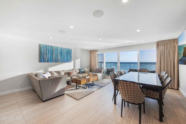 dining room with a water view