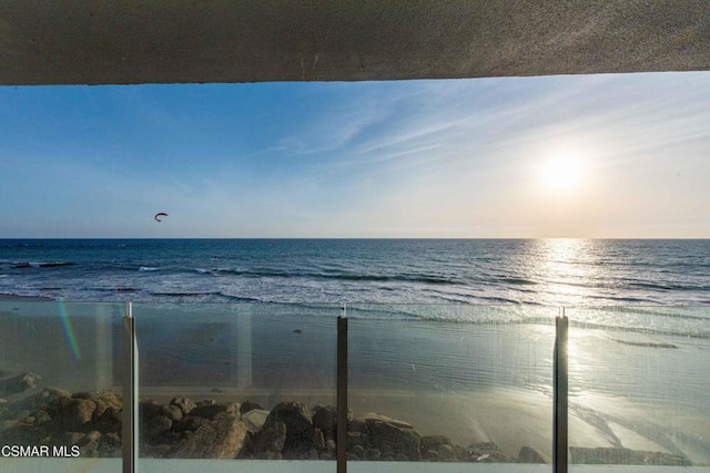 view of water feature with a beach view