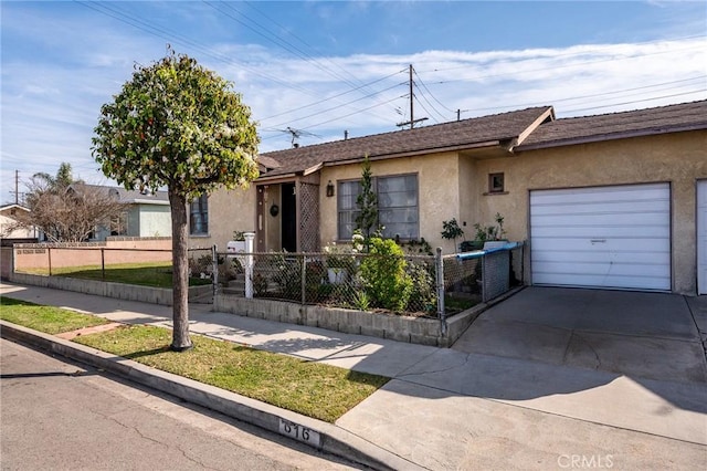 ranch-style house featuring a garage