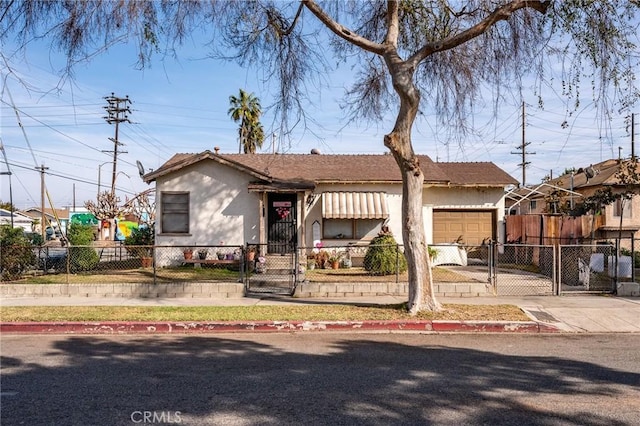 view of front of home featuring a garage