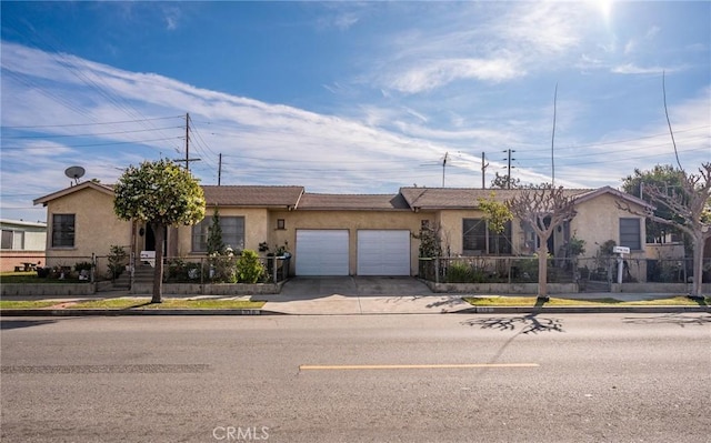 ranch-style home with a garage