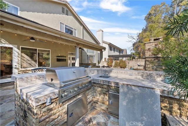 view of patio / terrace featuring sink, ceiling fan, a pergola, a grill, and area for grilling