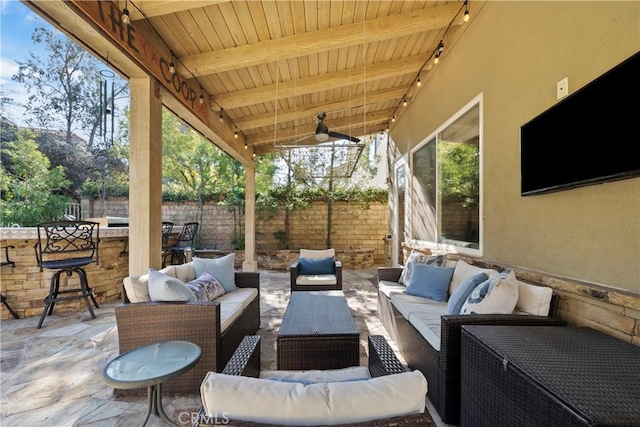 view of patio featuring outdoor lounge area and ceiling fan