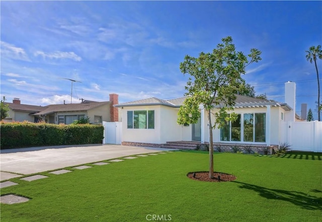 view of front of home with a front yard