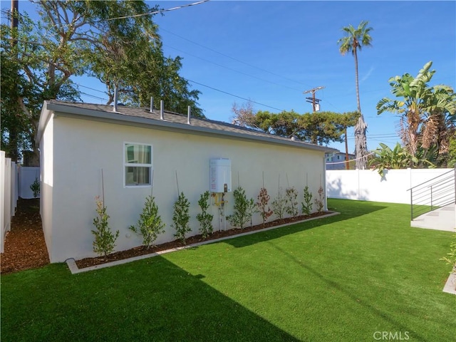 view of home's exterior featuring a yard