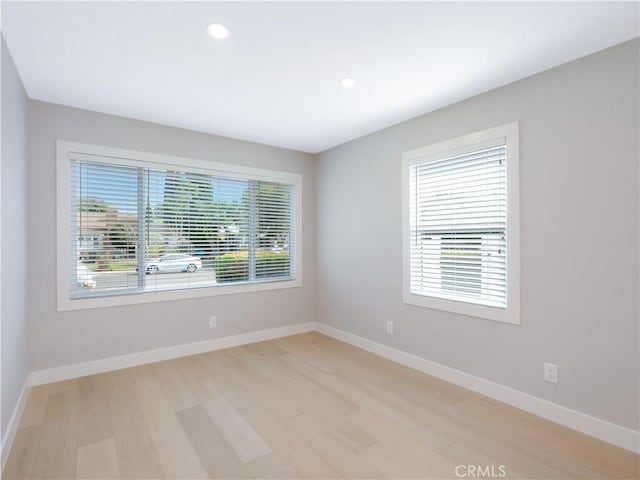 empty room featuring light hardwood / wood-style floors