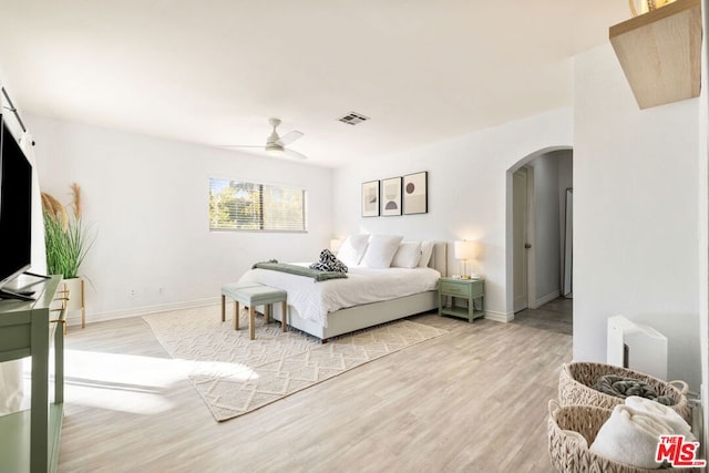 bedroom featuring hardwood / wood-style flooring and ceiling fan