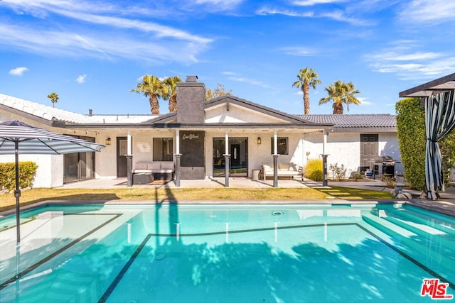 view of pool with a patio