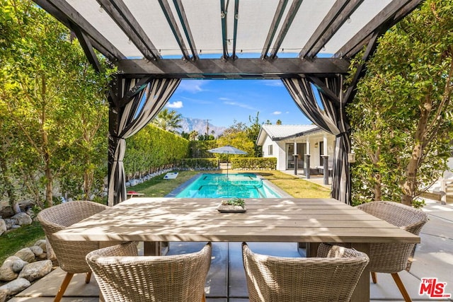 view of patio featuring a pergola