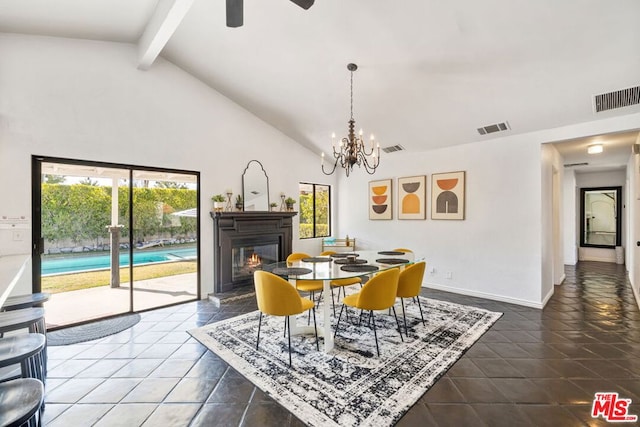 tiled dining room with beamed ceiling, ceiling fan with notable chandelier, and high vaulted ceiling