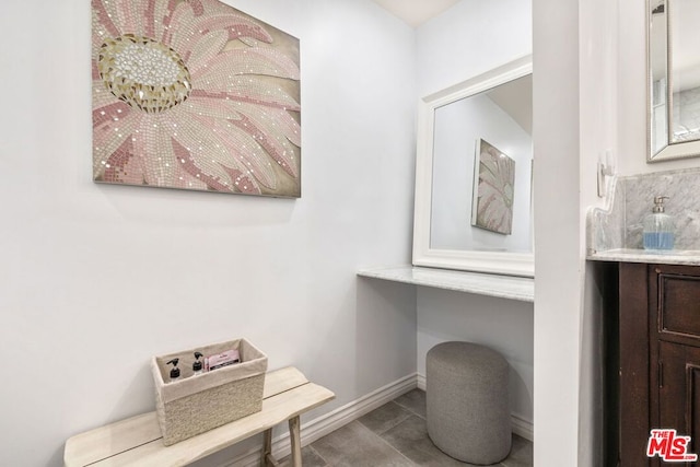 bathroom with vanity and tile patterned flooring