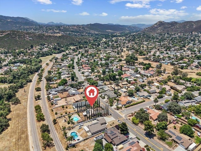 drone / aerial view featuring a mountain view