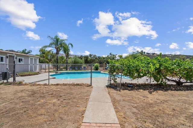 view of pool featuring a fenced in pool and fence