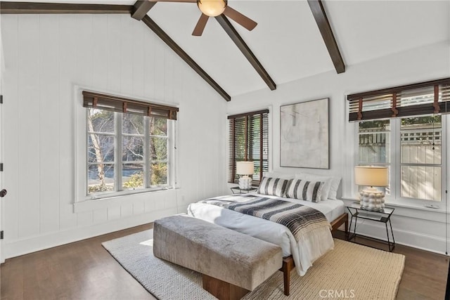 bedroom with ceiling fan, dark wood-type flooring, high vaulted ceiling, and beamed ceiling