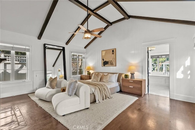 bedroom with ceiling fan, high vaulted ceiling, connected bathroom, dark hardwood / wood-style flooring, and beamed ceiling