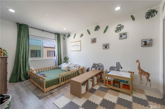 bedroom featuring light wood-type flooring