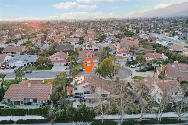 aerial view with a mountain view and a residential view