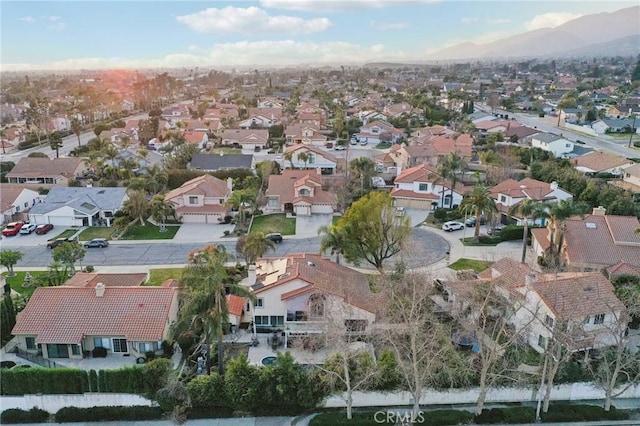 bird's eye view featuring a residential view and a mountain view