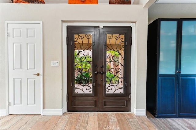 property entrance with french doors