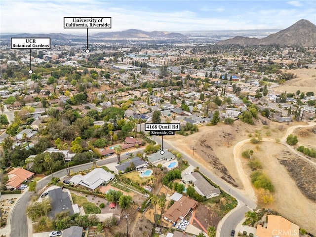 bird's eye view featuring a residential view and a mountain view