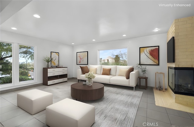 living room featuring recessed lighting, light tile patterned flooring, and a multi sided fireplace