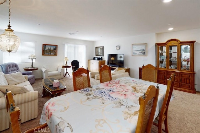 dining area featuring recessed lighting, visible vents, and light colored carpet