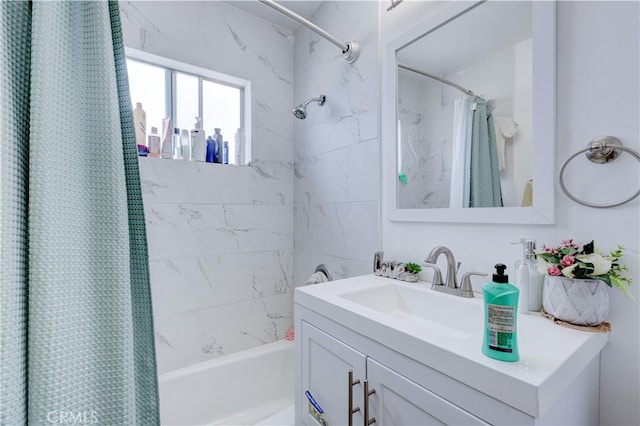 bathroom featuring vanity and shower / bath combination with curtain