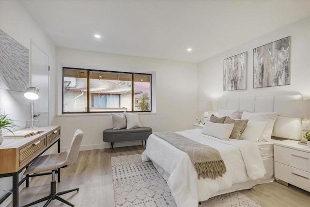 bedroom with light hardwood / wood-style flooring