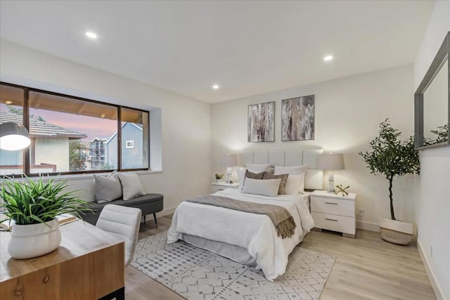 bedroom featuring light hardwood / wood-style floors