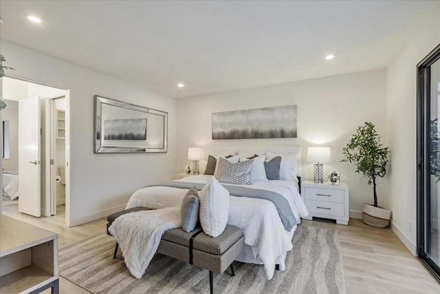 bedroom with light hardwood / wood-style floors