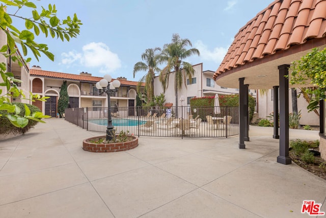 exterior space with a community pool