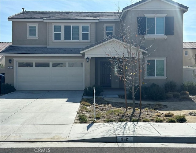 view of front of home featuring a garage