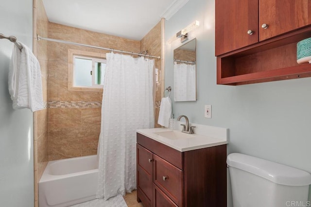 full bathroom featuring vanity, shower / bath combination with curtain, and toilet