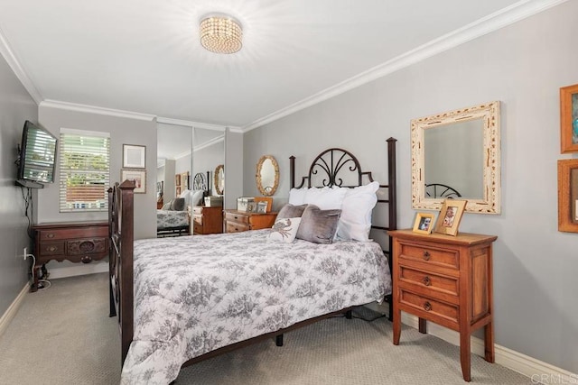 bedroom featuring ornamental molding, light colored carpet, and a closet