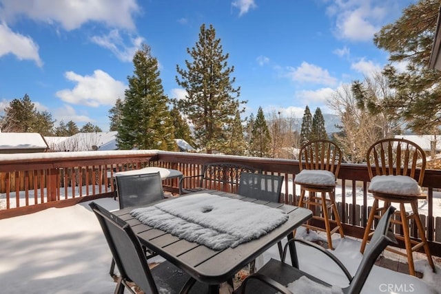 view of snow covered deck