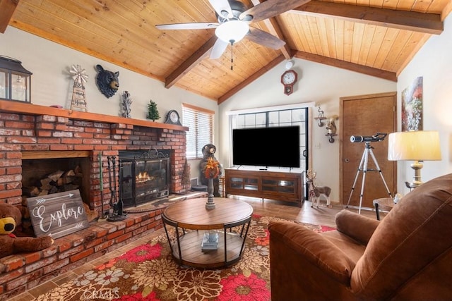 living room featuring a brick fireplace, wood ceiling, vaulted ceiling with beams, and ceiling fan