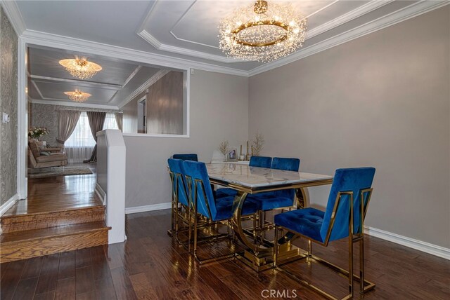 dining space with an inviting chandelier, crown molding, and dark wood-type flooring