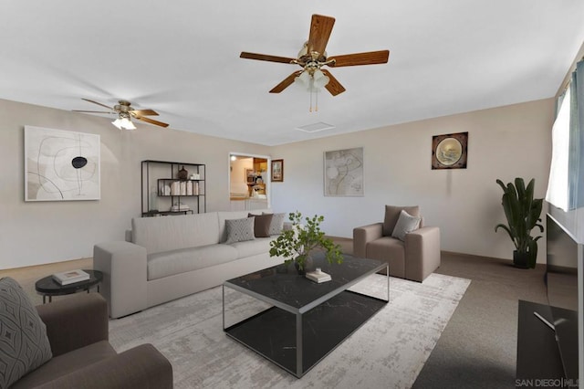 living room with light carpet and ceiling fan