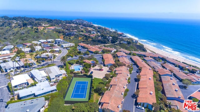 drone / aerial view with a view of the beach and a water view