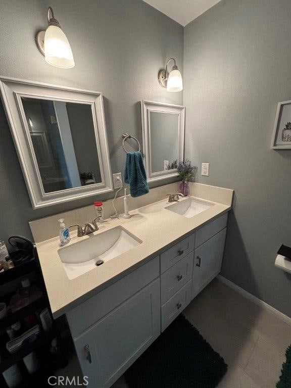 bathroom featuring vanity and tile patterned floors