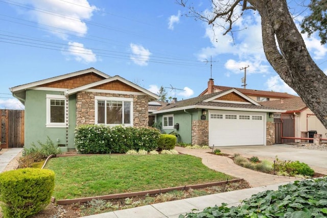 view of front of property featuring a garage and a front yard