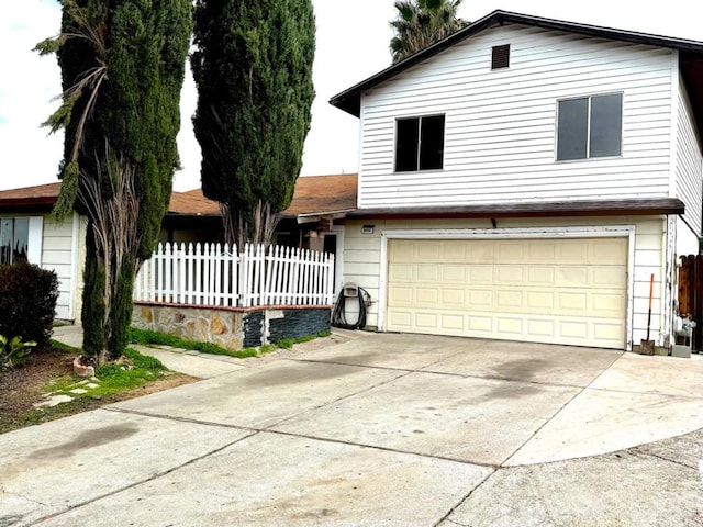 view of front of property featuring a garage