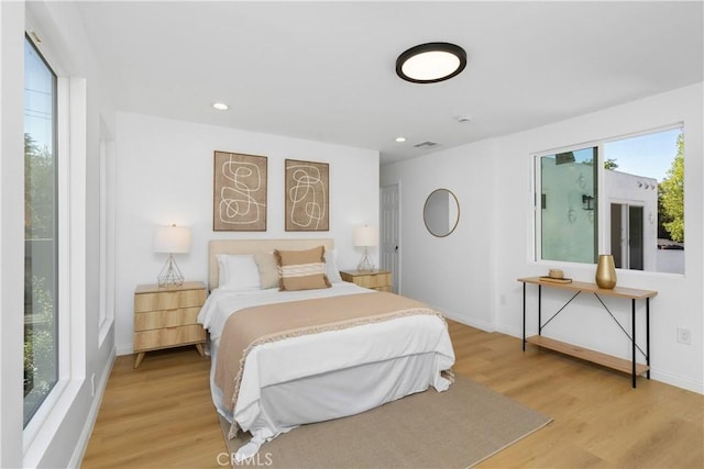 bedroom featuring light hardwood / wood-style floors