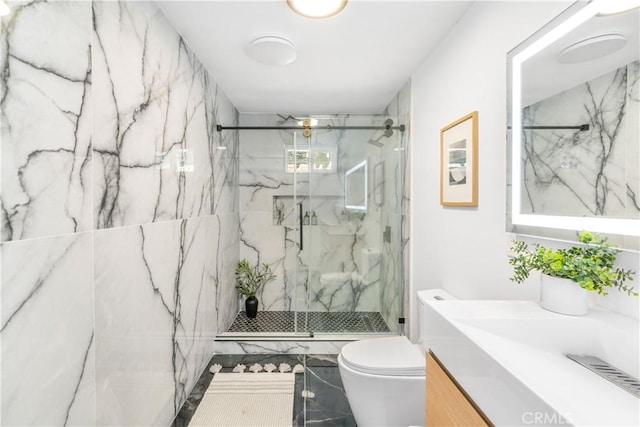 bathroom featuring walk in shower, vanity, and toilet