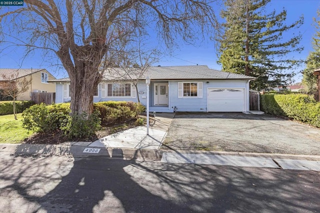 single story home with a garage