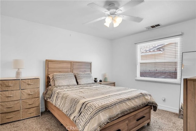 bedroom featuring ceiling fan and light colored carpet